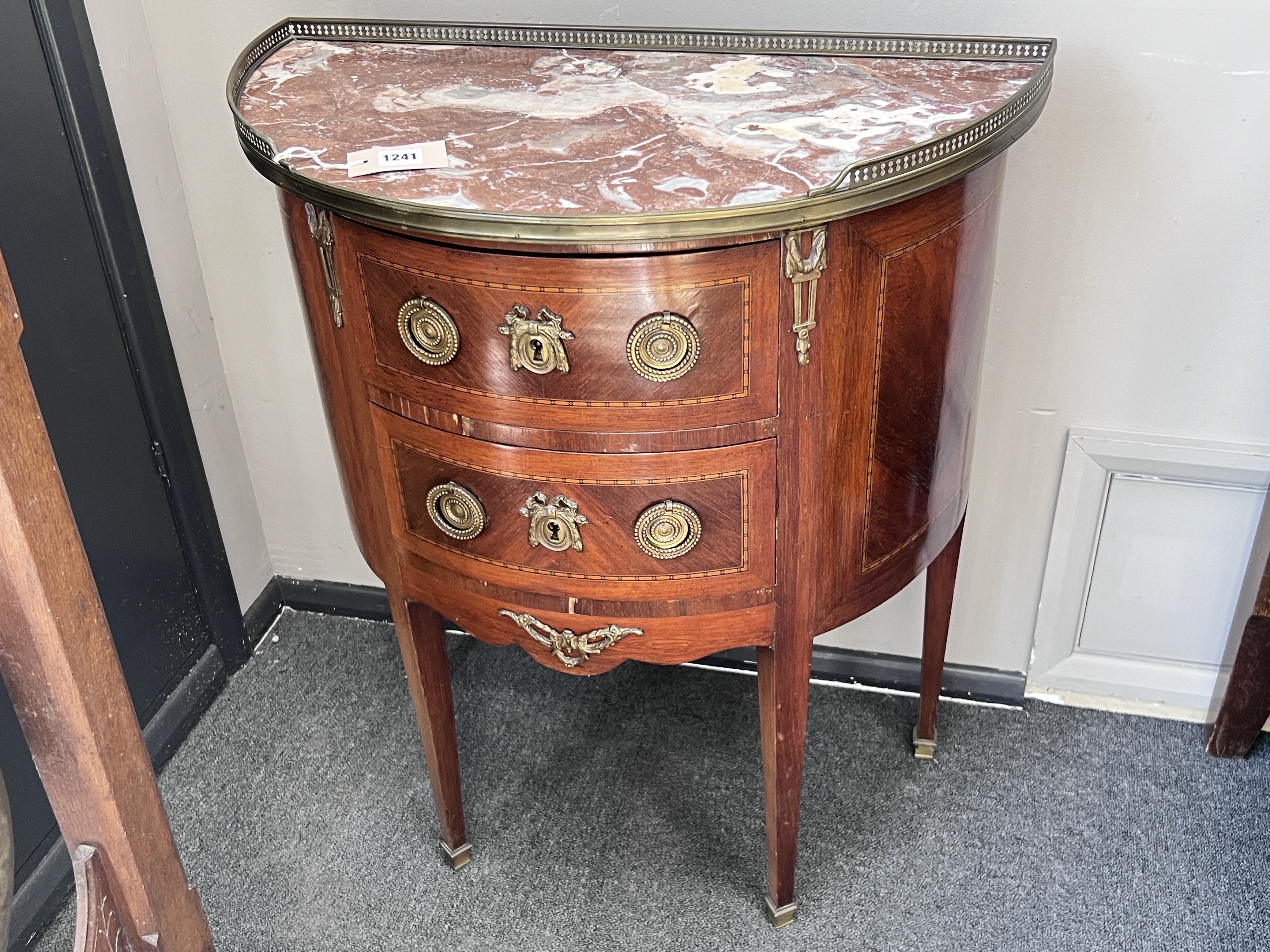 A Louis XVI style marble top demi lune two drawer petite commode, width 67cm, depth 36cm, height 78cm